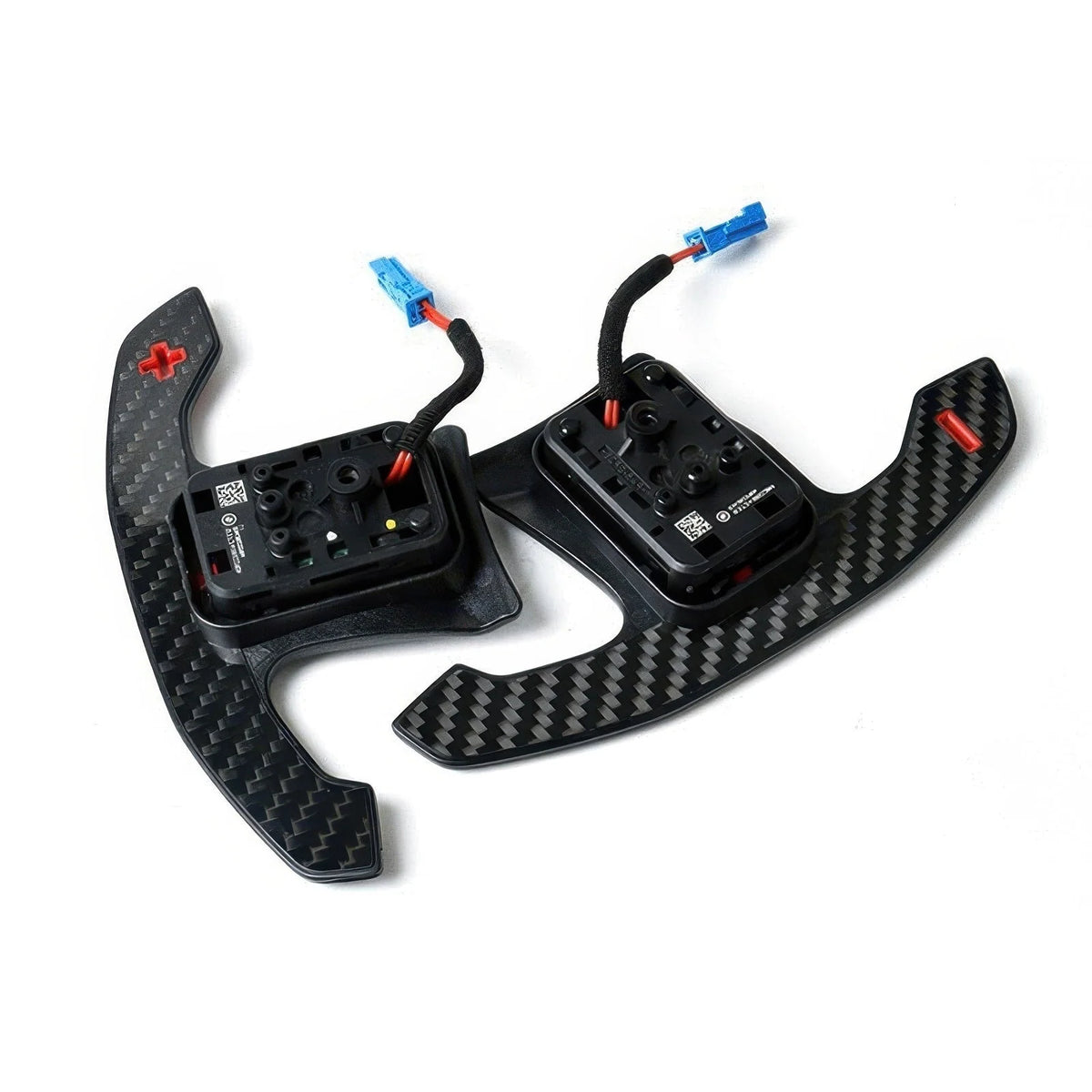 Paddle shifters with red symbols showing the switch housings and wiring